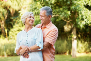 A man and woman standing next to each other.